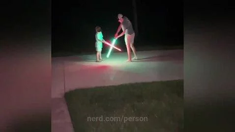 Lightsaber fight by person