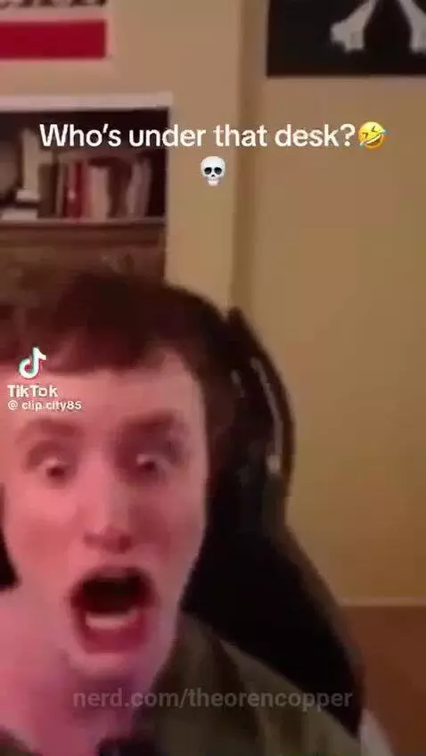 who is under that desk? by theorencopper